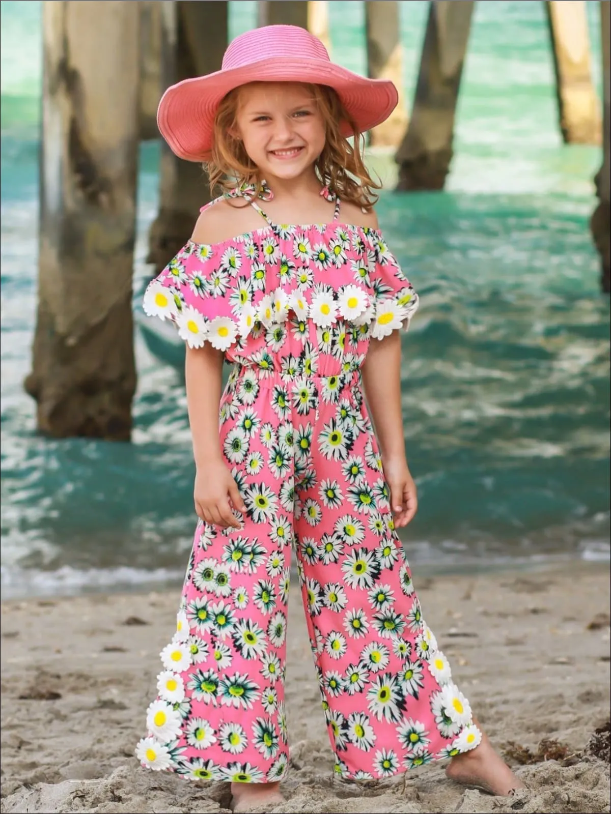 Girls Pink Daisy Print Off the Shoulder Ruffled Palazzo Jumpsuit with Daisy Appliques